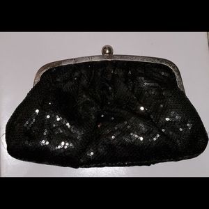 Alexia Crawford sequence flashy clutch